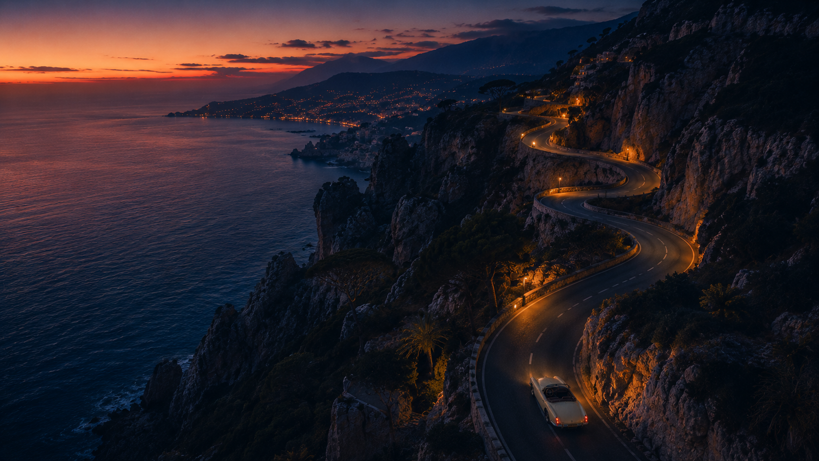 Aerial view of a vintage cream convertible on a winding coastal cliff road, the dark Mediterranean sea far below
